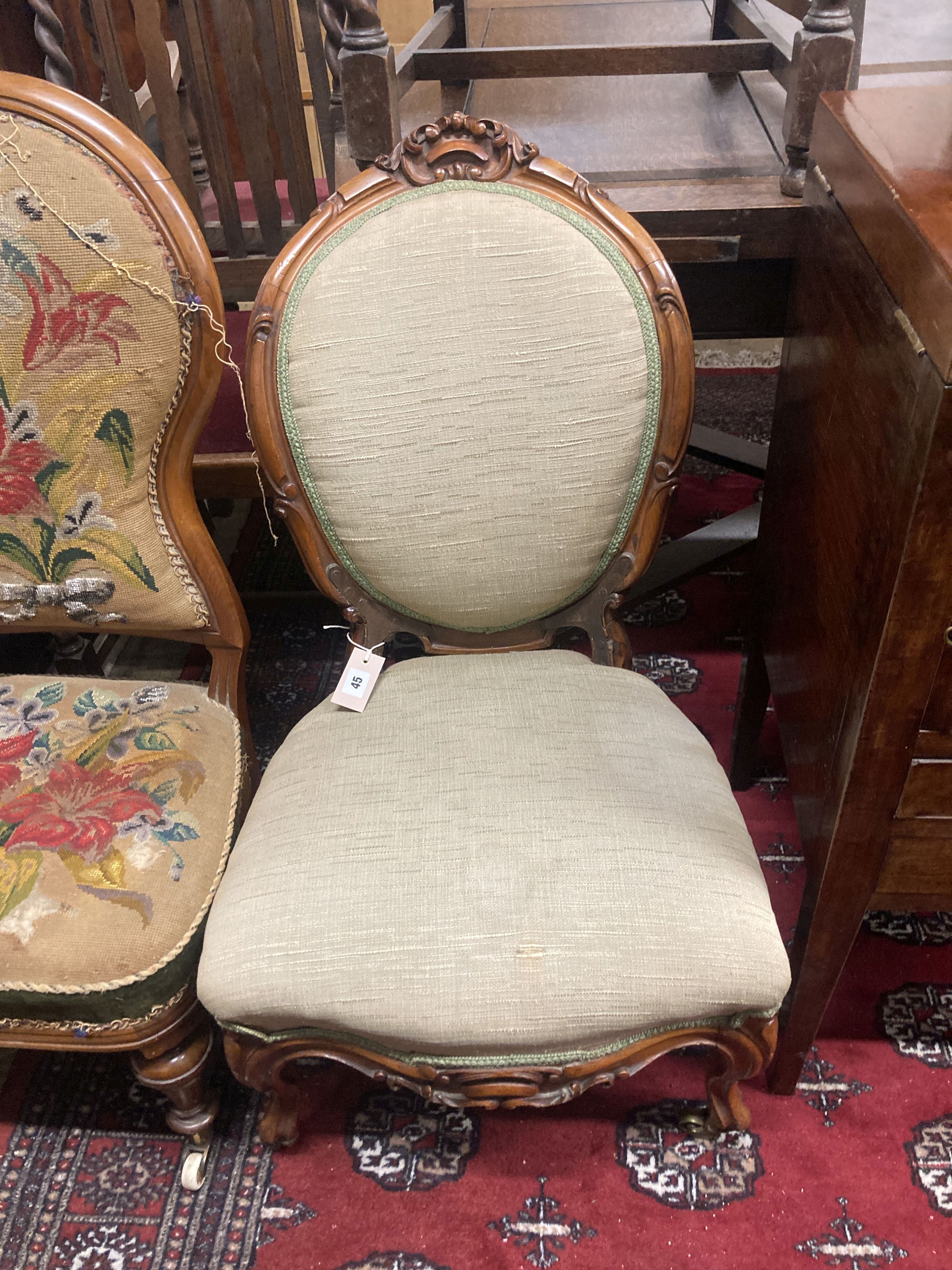 Two Victorian upholstered spoonback nursing chairs